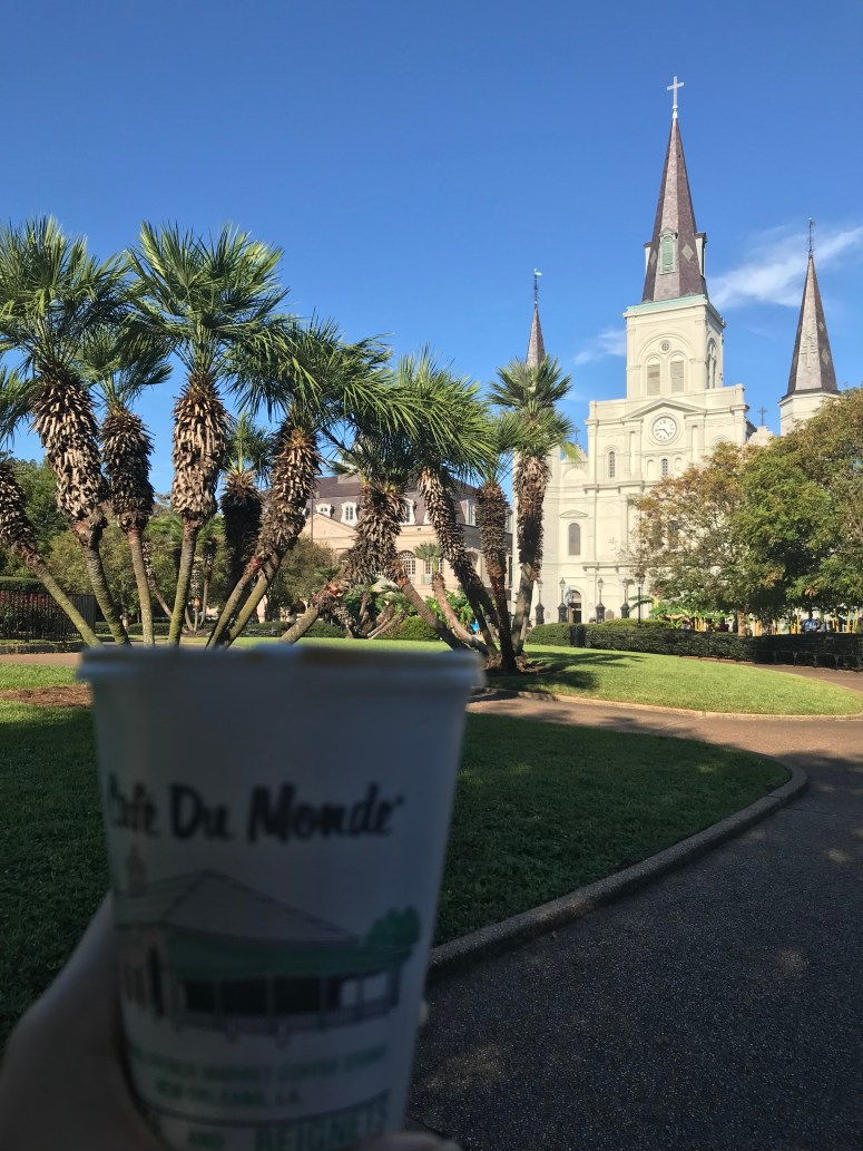 Drinking Cafe Du Monde in Jackson Square